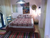 Postel nebo postele na pokoji v ubytování Rural Guest House فندق البيت الريفي