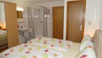 Posteľ alebo postele v izbe v ubytovaní Appartements Pfausler
