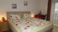 Posteľ alebo postele v izbe v ubytovaní Appartements Pfausler