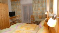 Posteľ alebo postele v izbe v ubytovaní Appartements Pfausler