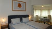 Posteľ alebo postele v izbe v ubytovaní Appartements Pfausler