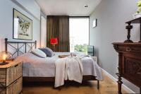 Posteľ alebo postele v izbe v ubytovaní Apartament Triton Park