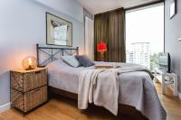 Posteľ alebo postele v izbe v ubytovaní Apartament Triton Park