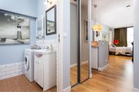 Posteľ alebo postele v izbe v ubytovaní Apartament Triton Park