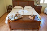 Postel nebo postele na pokoji v ubytování Hotel Karthea