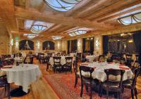 a restaurant with tables and chairs in a room at Eldorado Reno, A Caesars Destination in Reno