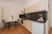 Kuchyň nebo kuchyňský kout v ubytování Joy Suites