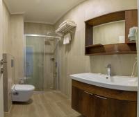 Koupelna v ubytování Joy Suites