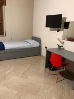 Posteľ alebo postele v izbe v ubytovaní Napoli City Inn