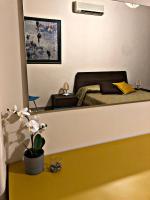Posteľ alebo postele v izbe v ubytovaní Napoli City Inn