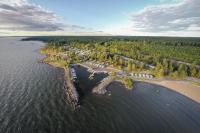 an aerial view of an island in the water at Askeviks Camping &amp; Stugor in Sjötorp