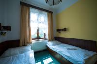 Postel nebo postele na pokoji v ubytování Pension City