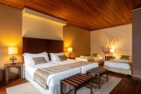 Uma cama ou camas num quarto em Luna Hotel Serra da Estrela