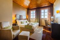 Uma cama ou camas num quarto em Luna Hotel Serra da Estrela
