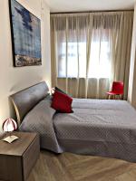 Posteľ alebo postele v izbe v ubytovaní Napoli City Inn