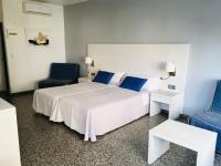 Postel nebo postele na pokoji v ubytování Hostal Pitiusa