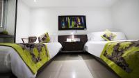 Hotel Golden Palermoにあるベッド