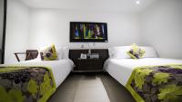Hotel Golden Palermoにあるベッド