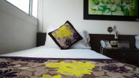 Hotel Golden Palermoにあるベッド