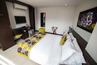 Hotel Golden Palermoにあるベッド