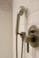 a shower head and a hose in a bathroom at OFFICINA TESINI Guest Rooms Verona in Verona