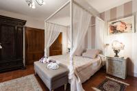 Posteľ alebo postele v izbe v ubytovaní Giardino della Pieve Relais- Adult Only