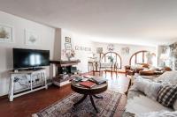 Televízia a/alebo spoločenská miestnosť v ubytovaní Giardino della Pieve Relais- Adult Only