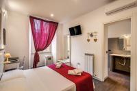 Posteľ alebo postele v izbe v ubytovaní GuestHouse o Affittacamere La civetta di Trastevere