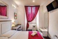 Posteľ alebo postele v izbe v ubytovaní GuestHouse o Affittacamere La civetta di Trastevere