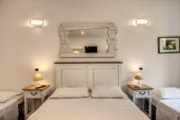 Posteľ alebo postele v izbe v ubytovaní GuestHouse o Affittacamere La civetta di Trastevere