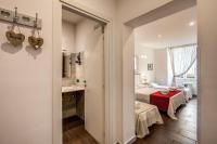 Posteľ alebo postele v izbe v ubytovaní GuestHouse o Affittacamere La civetta di Trastevere