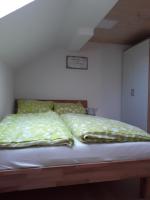 Un pat sau paturi &icirc;ntr-o camer&#x103; la Ferienwohnung Gmeiner