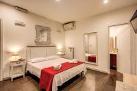 Posteľ alebo postele v izbe v ubytovaní GuestHouse o Affittacamere La civetta di Trastevere