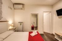 Posteľ alebo postele v izbe v ubytovaní GuestHouse o Affittacamere La civetta di Trastevere
