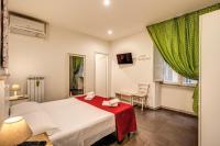 Posteľ alebo postele v izbe v ubytovaní GuestHouse o Affittacamere La civetta di Trastevere