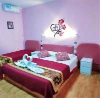 A bed or beds in a room at Ciclamino Siracusa