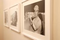 a black and white photo of a man holding a baseball bat at OFFICINA TESINI Guest Rooms Verona in Verona