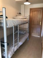 Posteľ alebo postele v izbe v ubytovaní Apartamento Deluxe a Pie de Pista Miramar Ski