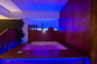 Łóżko lub łóżka w pokoju w obiekcie Hotel Domaso