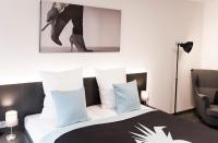 Postel nebo postele na pokoji v ubytování Mood contemporary living
