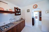 A kitchen or kitchenette at Villa Punta del Sole