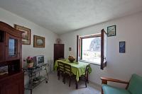 A television and/or entertainment centre at Villa Punta del Sole