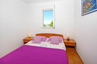 Posteľ alebo postele v izbe v ubytovaní Apartments Kus