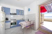 Kuchyňa alebo kuchynka v ubytovaní Apartments Kus