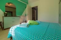 Posteľ alebo postele v izbe v ubytovaní APARTMAN MLADENKA