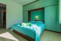 Posteľ alebo postele v izbe v ubytovaní APARTMAN MLADENKA