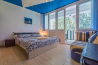 Posteľ alebo postele v izbe v ubytovaní APARTMAN MLADENKA