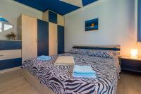 Posteľ alebo postele v izbe v ubytovaní APARTMAN MLADENKA