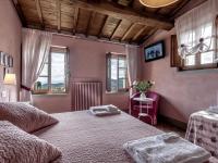 Posteľ alebo postele v izbe v ubytovaní Agriturismo La Forra