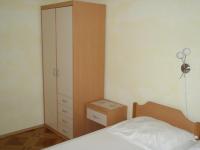 Postel nebo postele na pokoji v ubytování Apartments Ariana